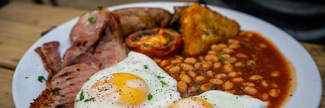 contractor now living in UK enjoying a full english breakfast