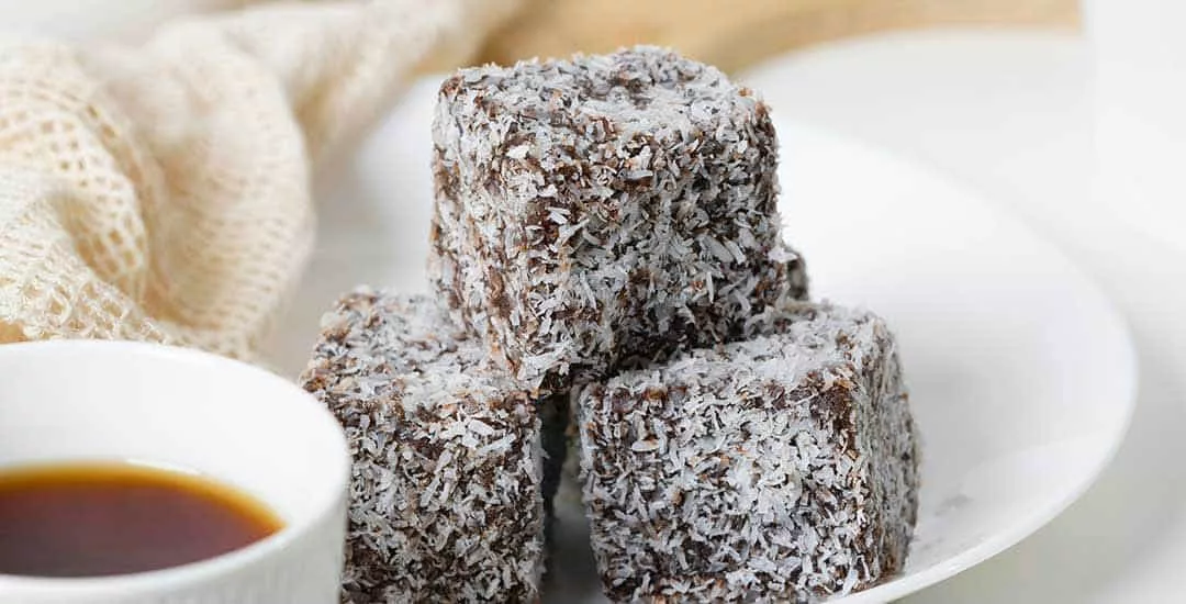 plate of chocolate lamingtons