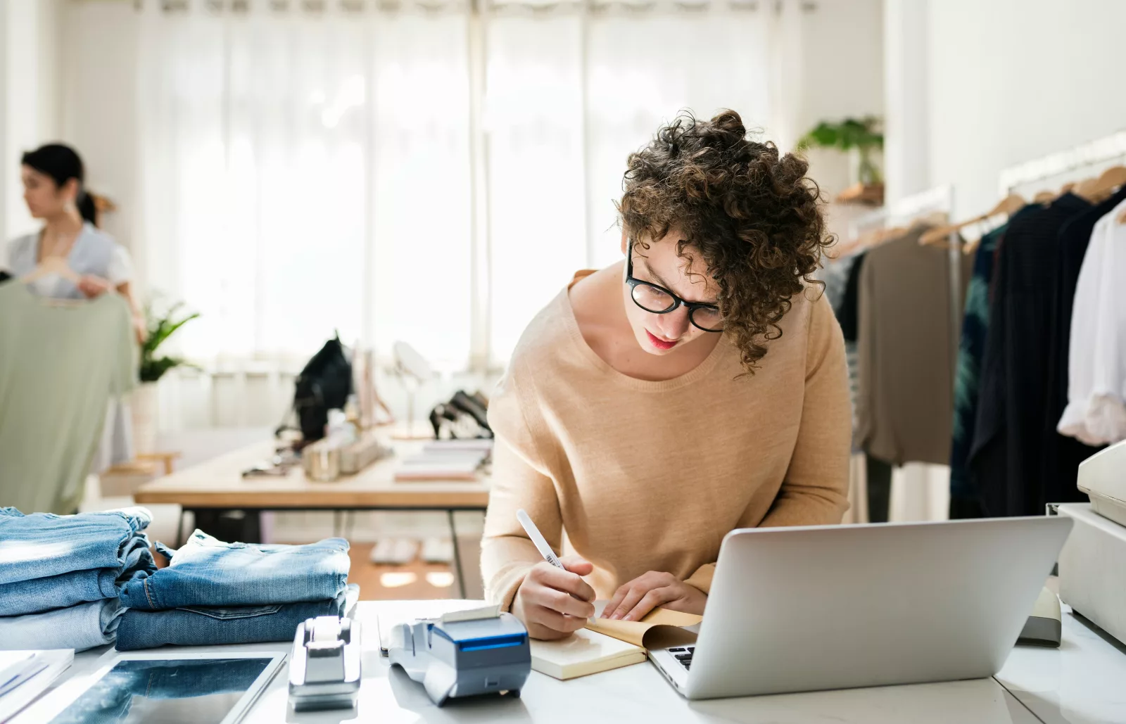 Person working at desk in clothing business