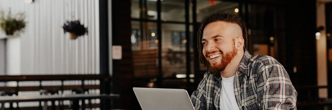 A person looking at a fee structure comparison, showing the costs and fees associated with umbrella companies
