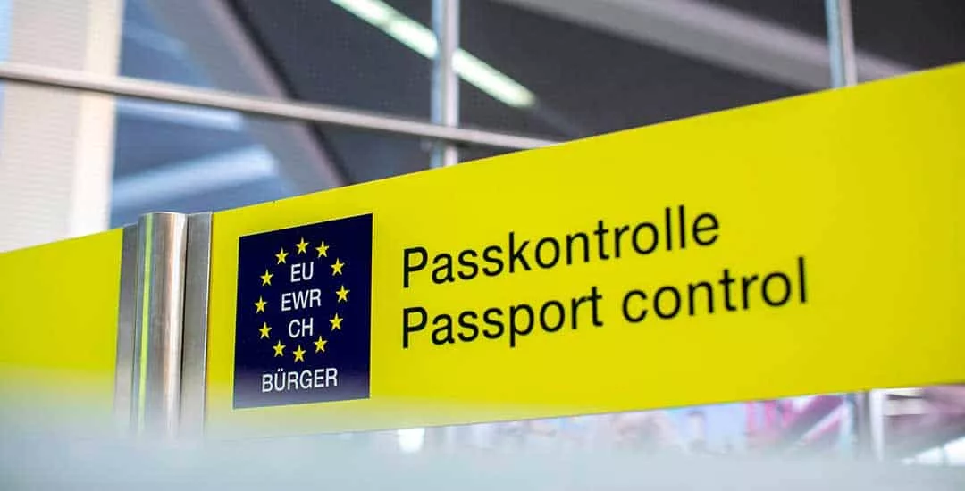 passport control sign at airport