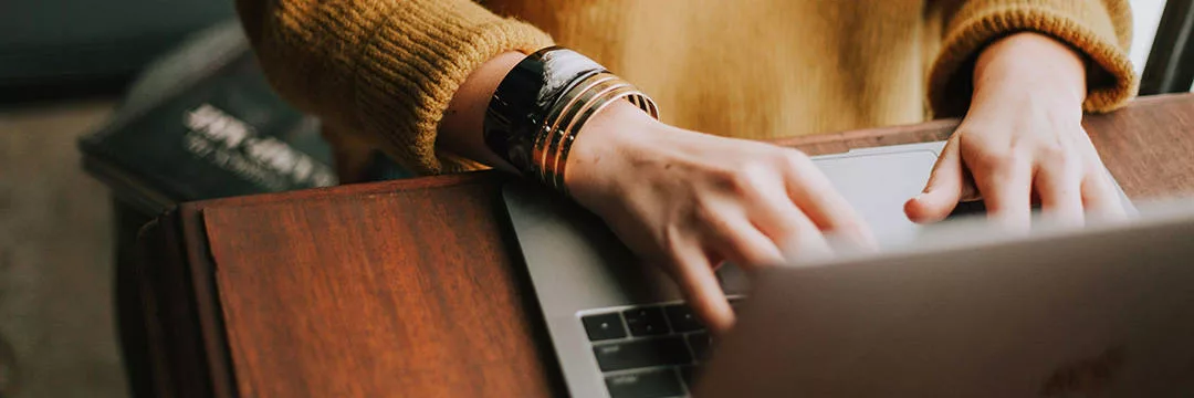 person completing an online application process