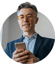 Man with phone providing contractor accountancy services