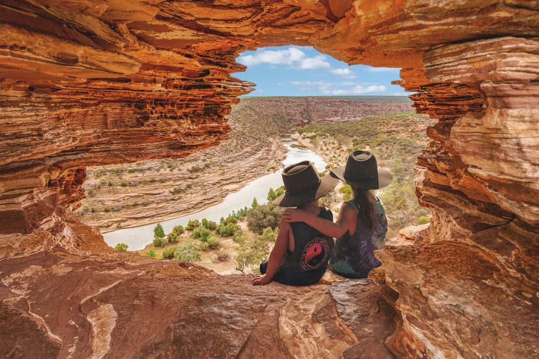 Two kids in the Australian outback. Still too young to understand our tax advice for Australians moving to the UK