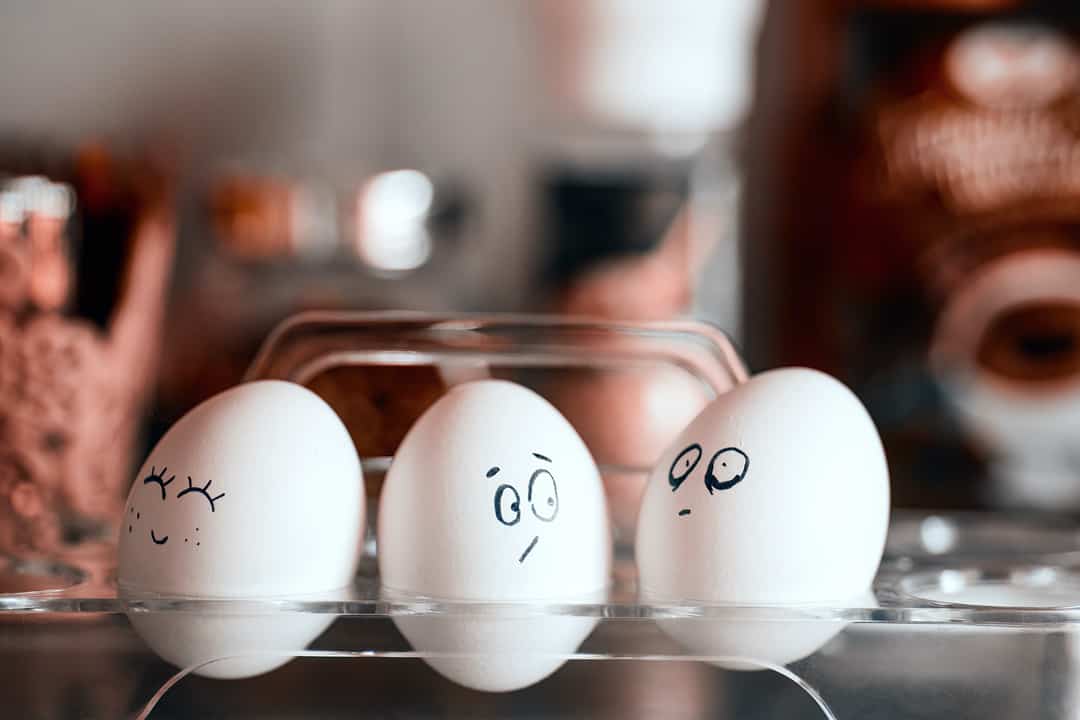 Three eggs in a row representing the three main types of contractor insurance