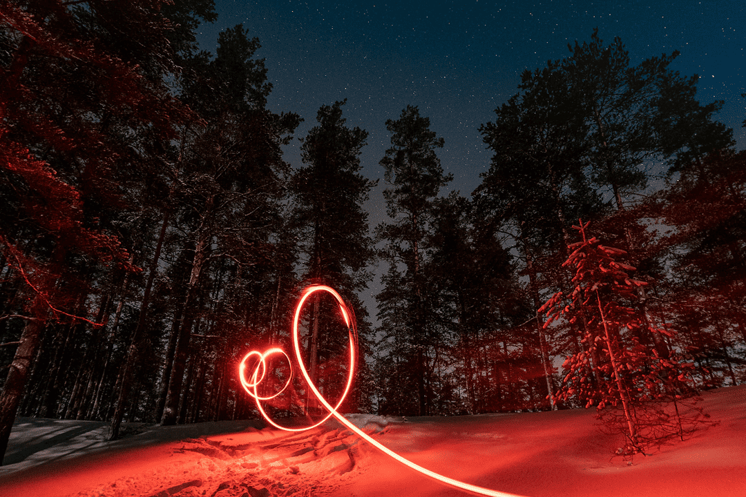 red-light-over-snow Red light over snow seen by contractors walking home from the office Christmas party