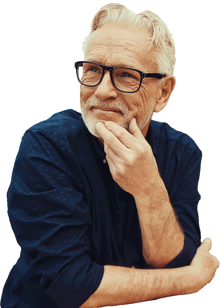 image of man in a dark blue work shirt and glasses with hand on chin looking happy and content