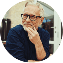 Contractor professional using a corporation tax calculator at a desk