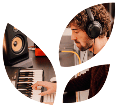 man sitting at desk with keyboard working in the creative industries